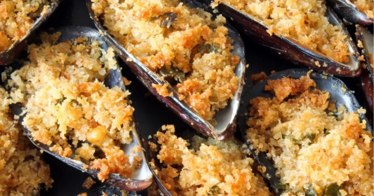 Cozze gratinate: la ricetta tradizionale per un antipasto di mare irresistibile